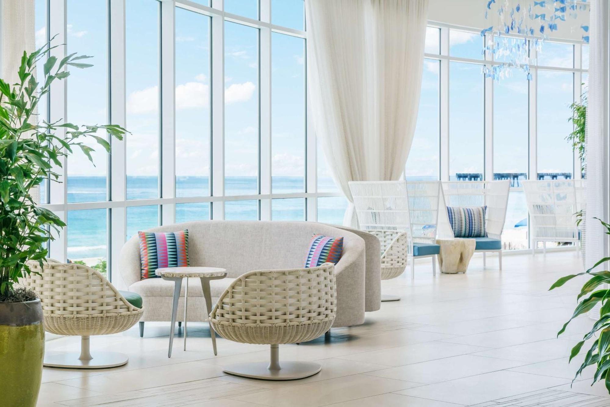 Hyatt Place Panama City Beach - Beachfront Exterior photo The lobby of the Ritz-Carlton, Maldives, Fari Resort